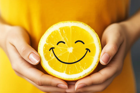 happy lemon slice held