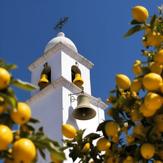 white bell tower with lemon tree